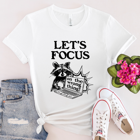 Let's Focus on the Wrong Thing - 100% Cotton Tee - Unisex